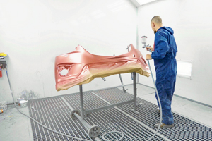 Part of car body being painted